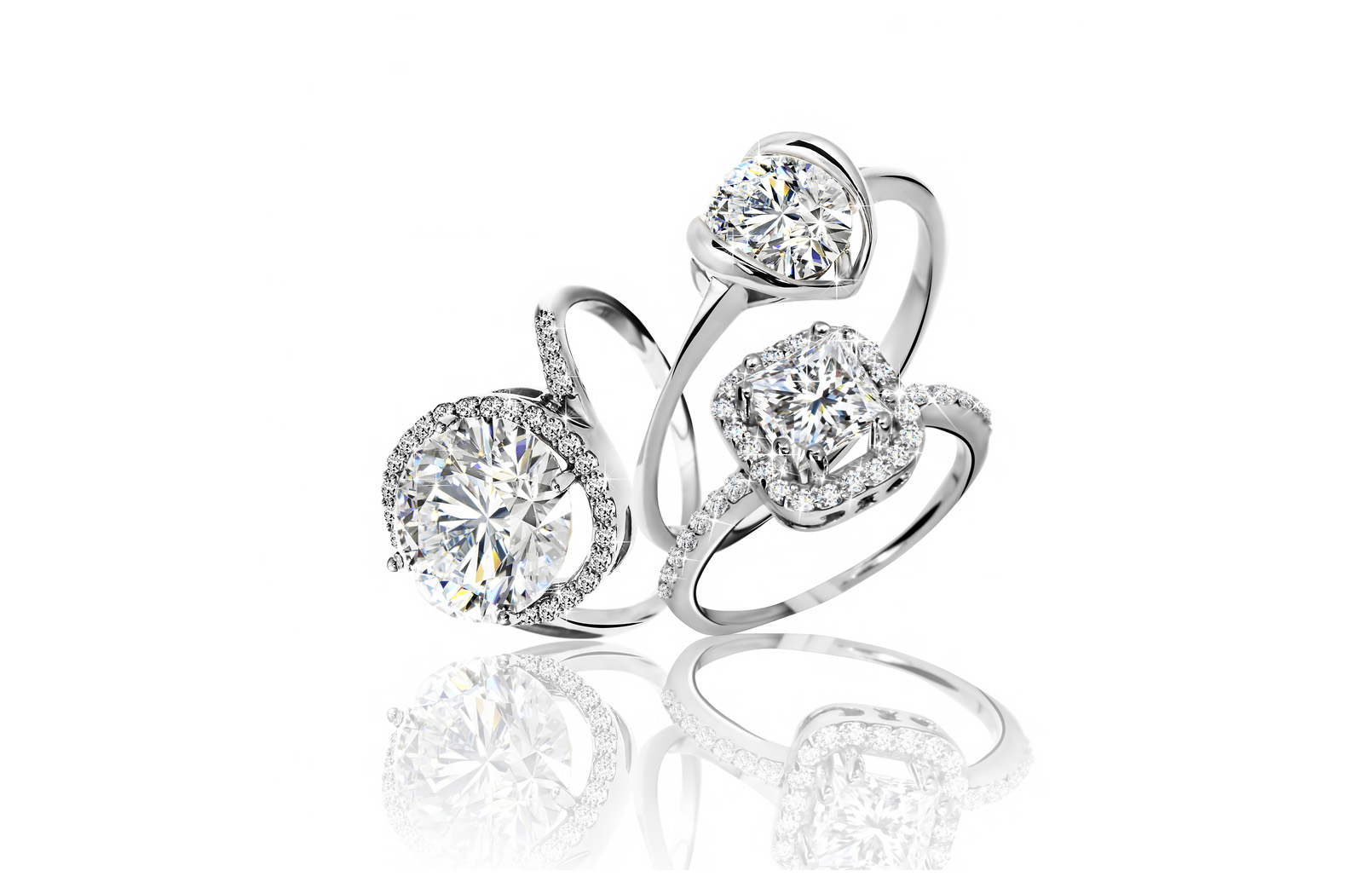 Three white gold custom engagement ring in different diamond cuts