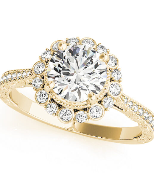 top view of a yellow gold diamond round halo engagement ring