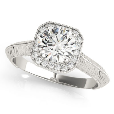 White gold clean diamond ring with halo with a diamond center stone with an intricate design on band