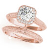 Two rose gold halo engagement rings with a diamond center stone on one ring and intricate designs on each band