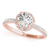 top view of a rose gold diamond star-like halo engagement ring with a number of side and accent stones