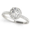 top view of a white gold diamond star-like halo engagement ring with a number of side and accent stones
