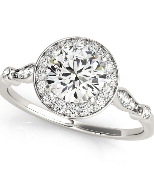top view of a white gold diamond halo engagement ring surrounded by smaller diamonds