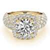 a thick band yellow gold diamond halo engagement ring surrounded by smaller diamonds also on each shoulder