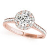 top view of a petite rose gold halo engagement ring with a round diamond gripped by 4 prongs surrounded in smaller diamonds