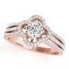 Top view of a rose gold clover shaped pave halo engagement ring in three row bands with set of smaller diamonds