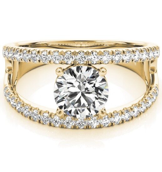 A round shape diamond ring in a split shank setting with set of small diamonds in a row