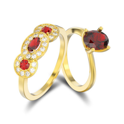 Yellow Gold Three-Stone Ruby Ring Yellow gold three stone engagement ring ring consist of small pave of diamonds with ruby at the center and a yellow gold single ruby stone diamond ring