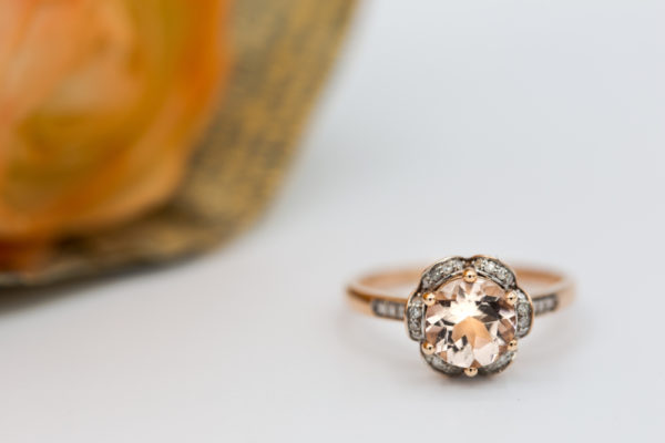 a morganite engagement ring held by 6 prong and rose gold metal