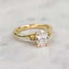 Custom Engagement Ring with Yellow Gold Band, Oval Cut Diamond & Round Yellow Sapphire Trilogy