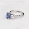 Custom Trilogy Engagement Ring with Twisted Platinum Band & Oval Cut Ceylon Sapphire with Round Cut Diamond Side Stones