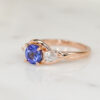 Custom Engagement Ring with Rose Gold Band, Round Cut Tanzanite & Pear Diamond Trilogy