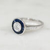 Custom Engagement Ring with Round Cut Diamond & Sapphire Halo