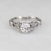 Custom Vintage Engagement Ring with Round Cut Diamond & Accent Stones