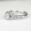 Custom Vintage Engagement Ring with Round Cut Diamond & Accent Stones